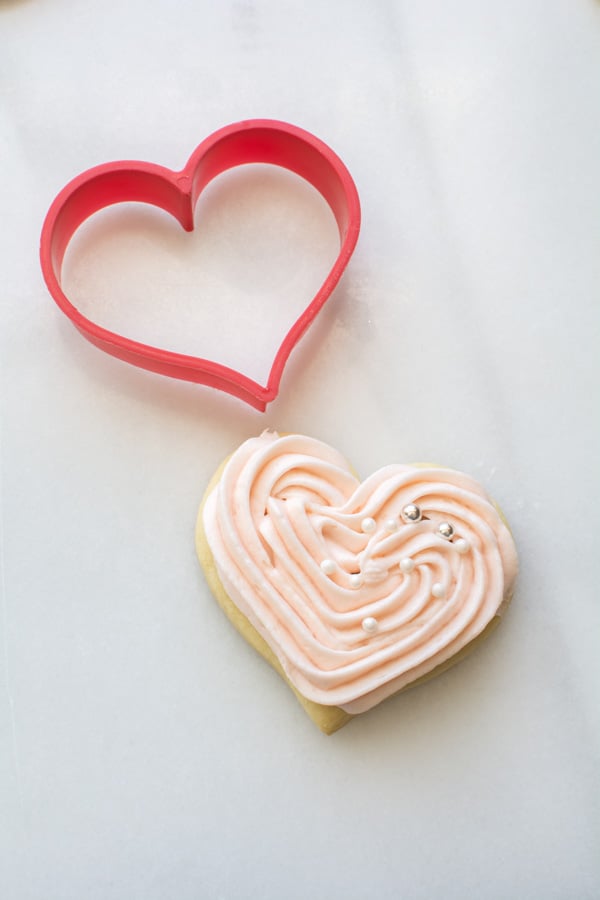 Iced heart sugar cookie with cutter