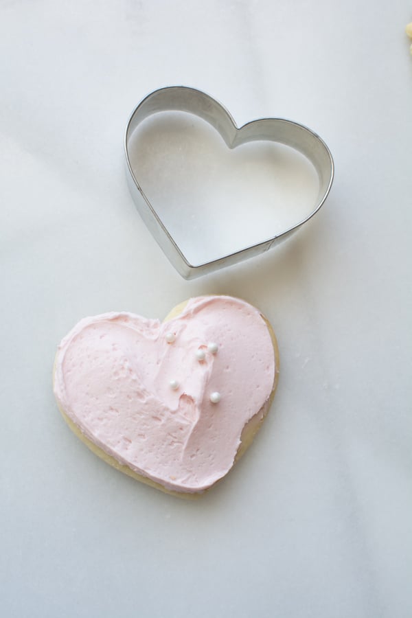 pink iced heart sugar cookie with cutter