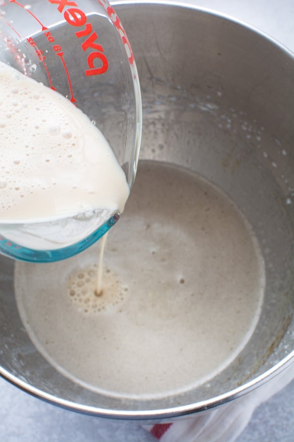 yeast pouring into egg mixture