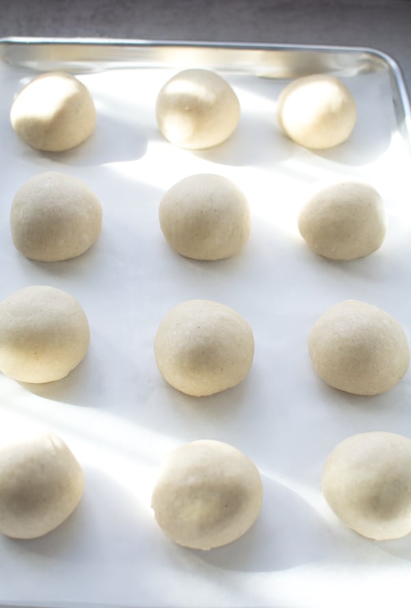 balls on dough on baking sheet