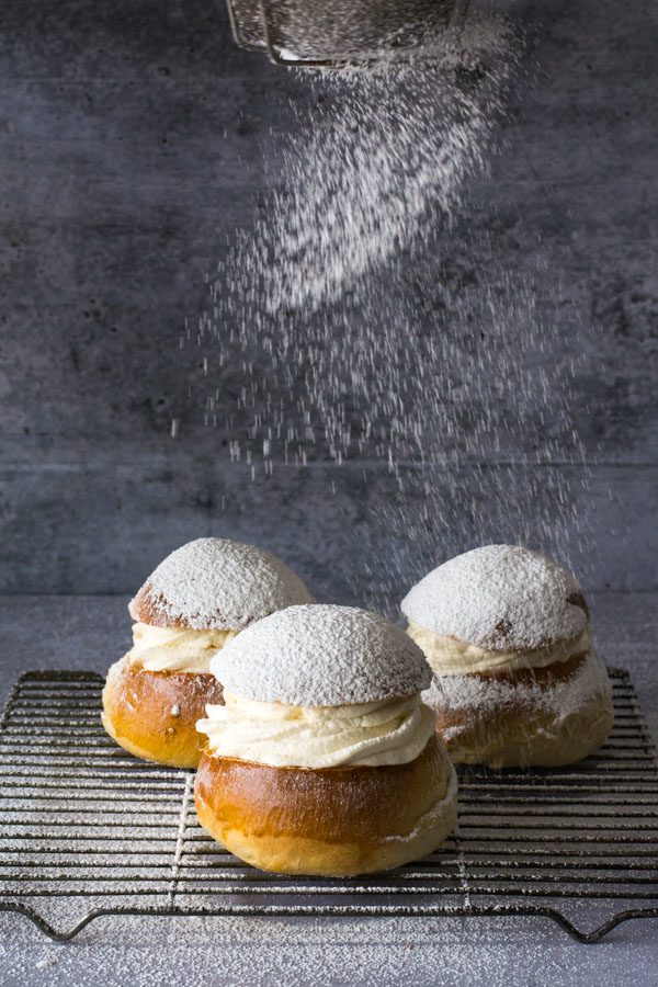 Semlor buns with dusting of powdered sugar