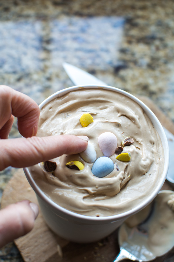 ice cream in quart container with chocolate eggs on top