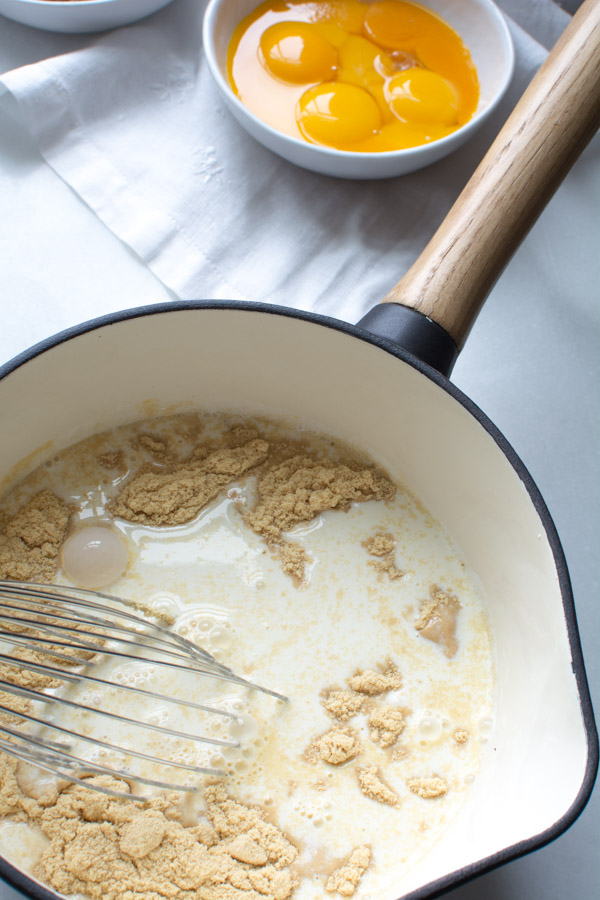 saucepan with cream and malted milk powder