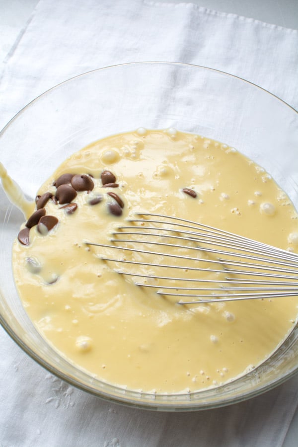 hot ice cream base poured over chocolate chips