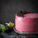 chocolate zucchini cake with hibiscus icing one great plate with black background