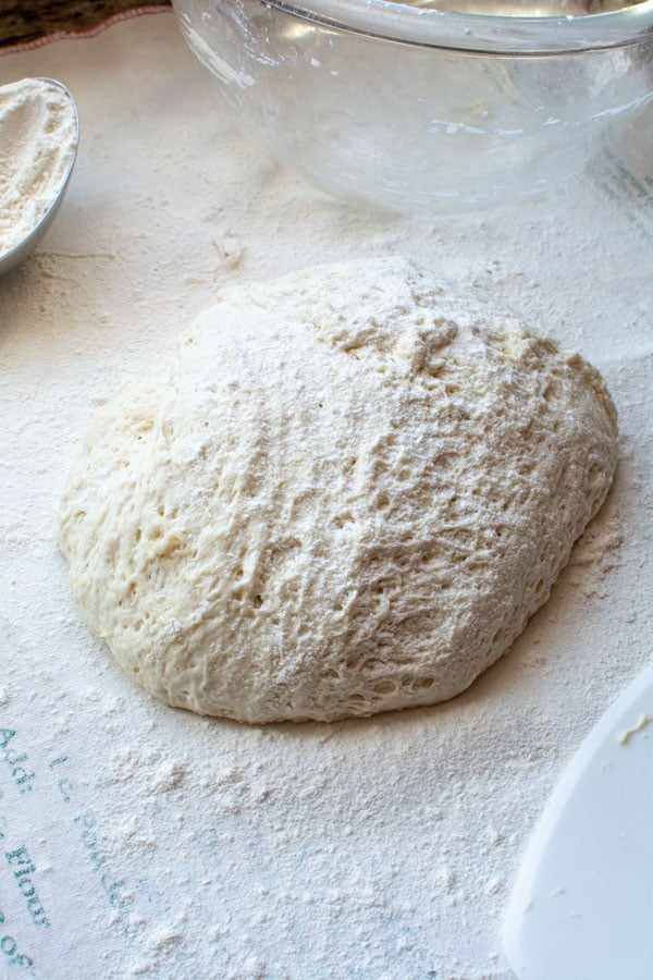 Ball of fougasse dough on floured cloth