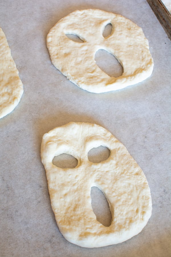 ghost fougasse unbaked on baking sheet