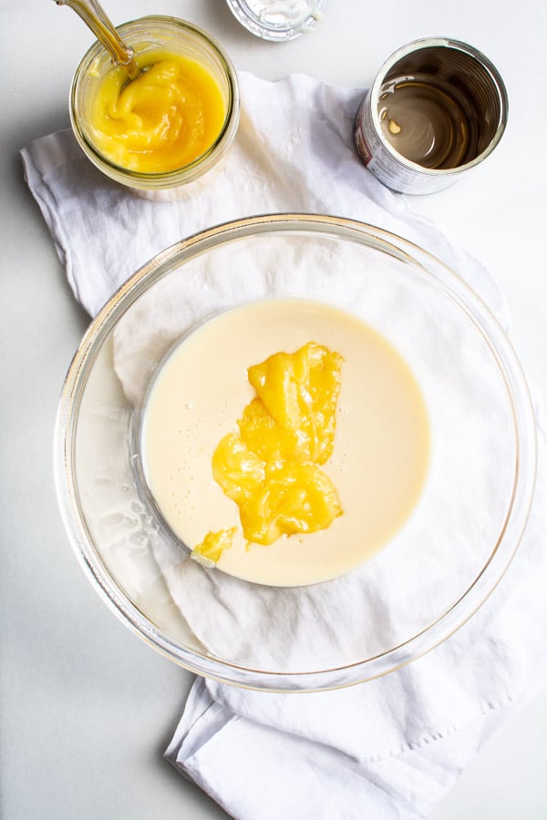 bowl with condensed milk and lemon curd