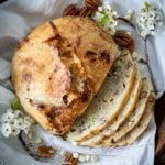 Overhead shot of white chocolate pecan bread with 4 slices