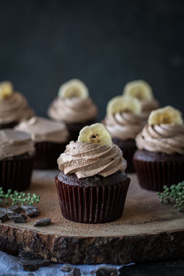 Chocolate chunk banana cupcakes with nutella icing banana chip on top