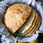 overhead shot of sliced No-knead Lemon Rosemary Gruyere Bread