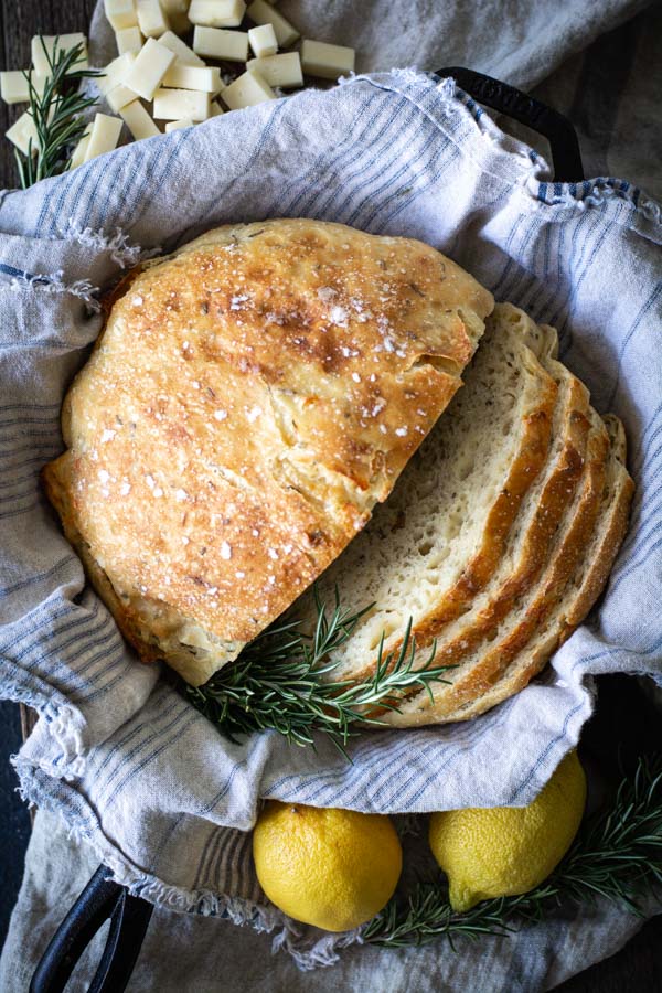 overhead shot of sliced No-knead Lemon Rosemary Gruyere Bread