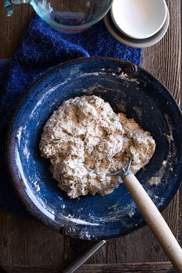 Hand dough kneader stirring Dakota bread dough