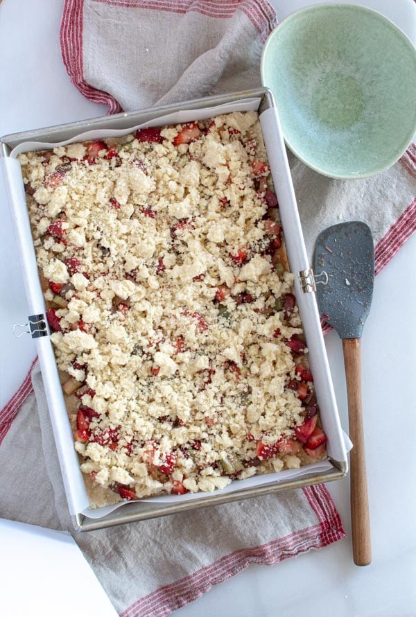 Baking pan with unbaked strawberry rhubarb crumble