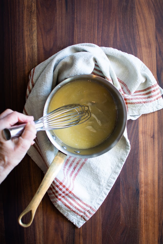 Saucepan with melted butter and flour.