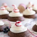 Chocolate cookies with cream cheese icing swirl topped with peppermint candy