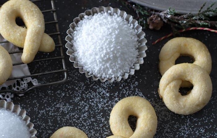 Norwegian berlinerkranser cookies with sugar sprinkles and platter