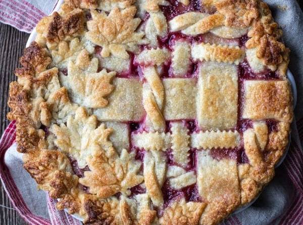 Baked cranberry peach pie with lattice crust
